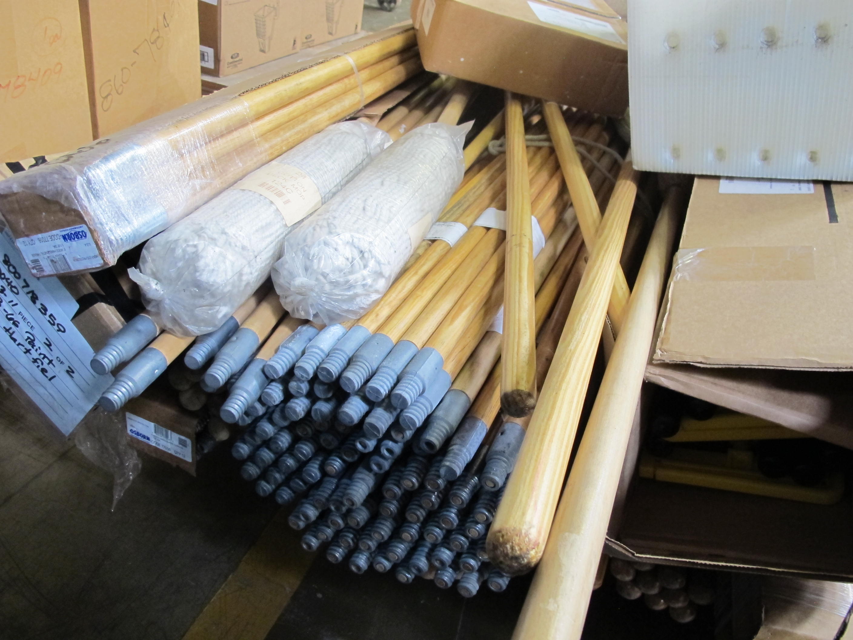 LOT TO INCLUDE: LARGE QUANTITY OF BROOM HANDLES, BROOMS, DUSTPANS, BROOM HEADS, MOP HEADS. LOADING & HANDLING FEE $30-4119